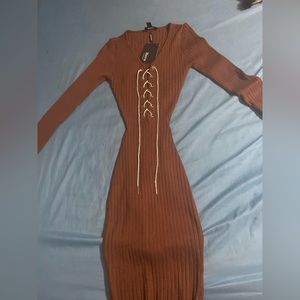 I am selling a long sleeved brown small brown dress